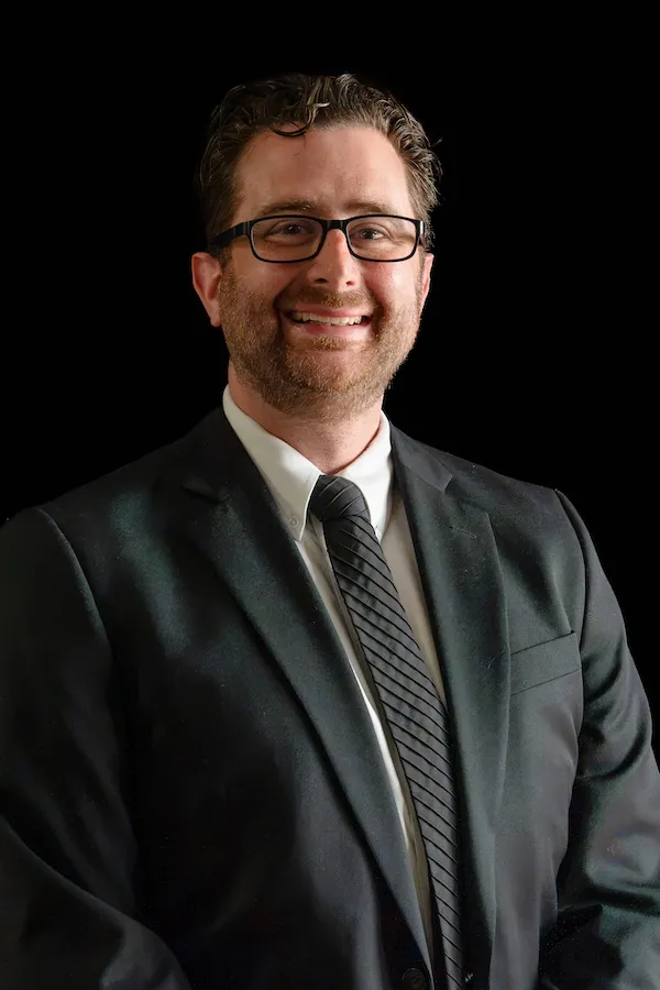 Mr. Adam Young
